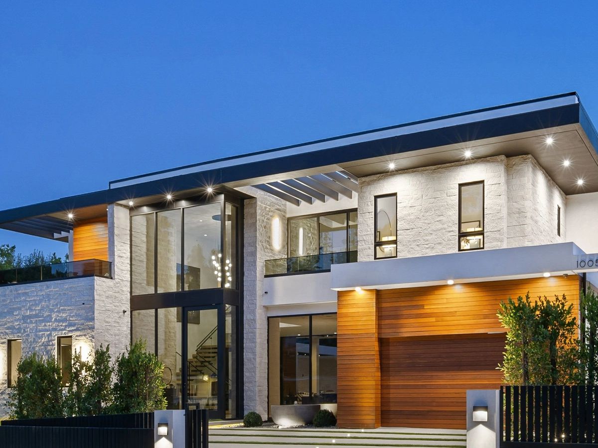 Illuminated home entry and walkway at night